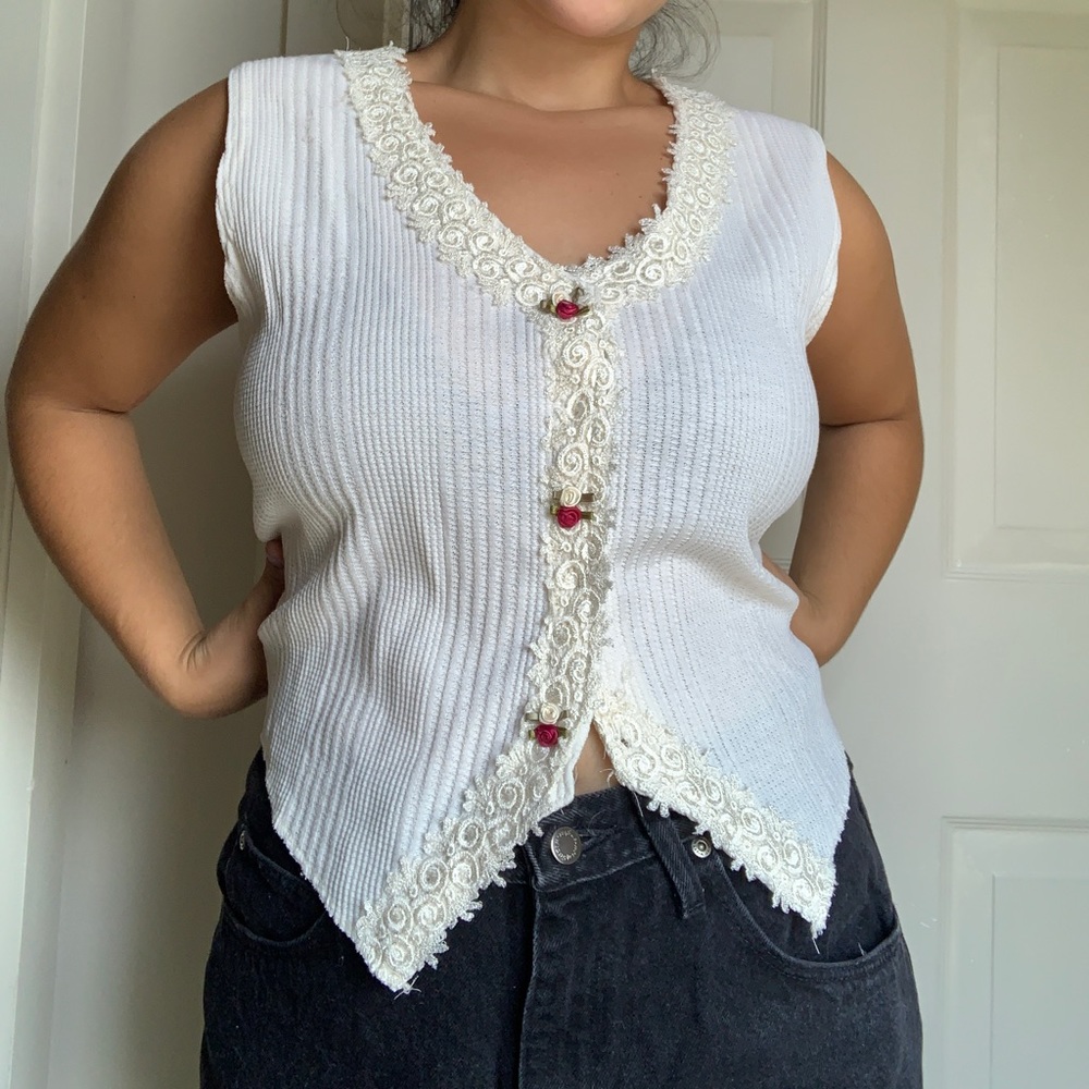 Cream vest with lace detailing and rose buttons